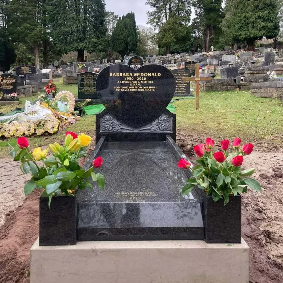 Black granite heart headstone with gold leaf inscription and matching kerb set by FR Terrazzo, Rhondda Cynon Taff