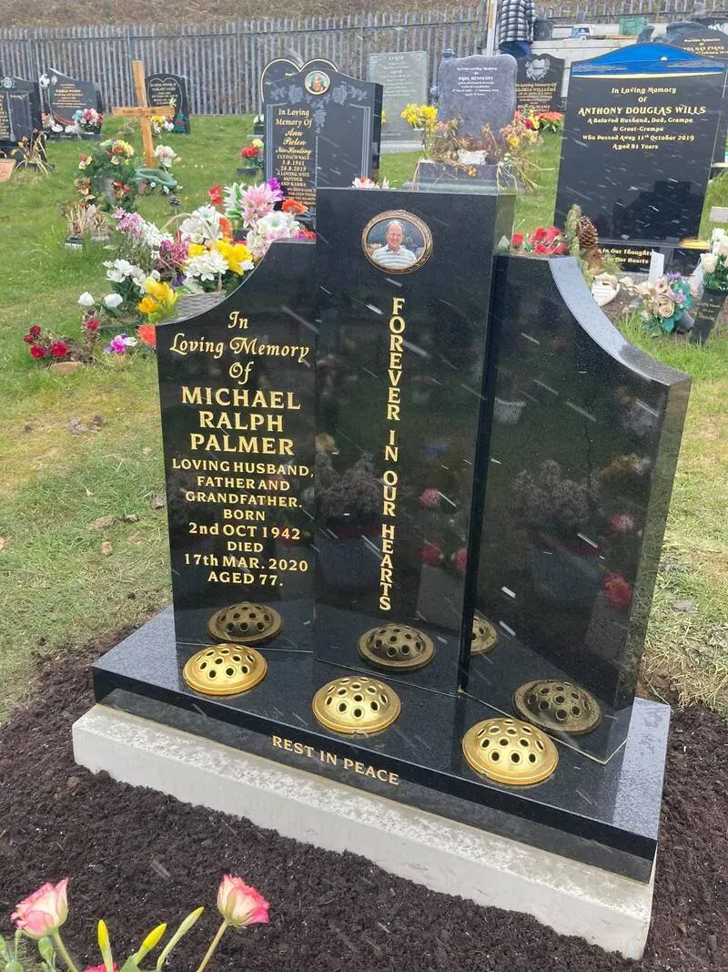 Contemporary sculpted black granite memorial with a ceramic portrait inset by FR Terrazzo, Rhondda Cynon Taff