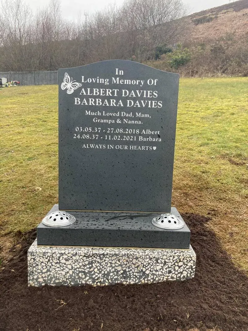 Grey granite headstone with an ogee top, gilded butterfly detail and gold leaf inscription by FR Terrazzo, Rhondda Cynon Taff
