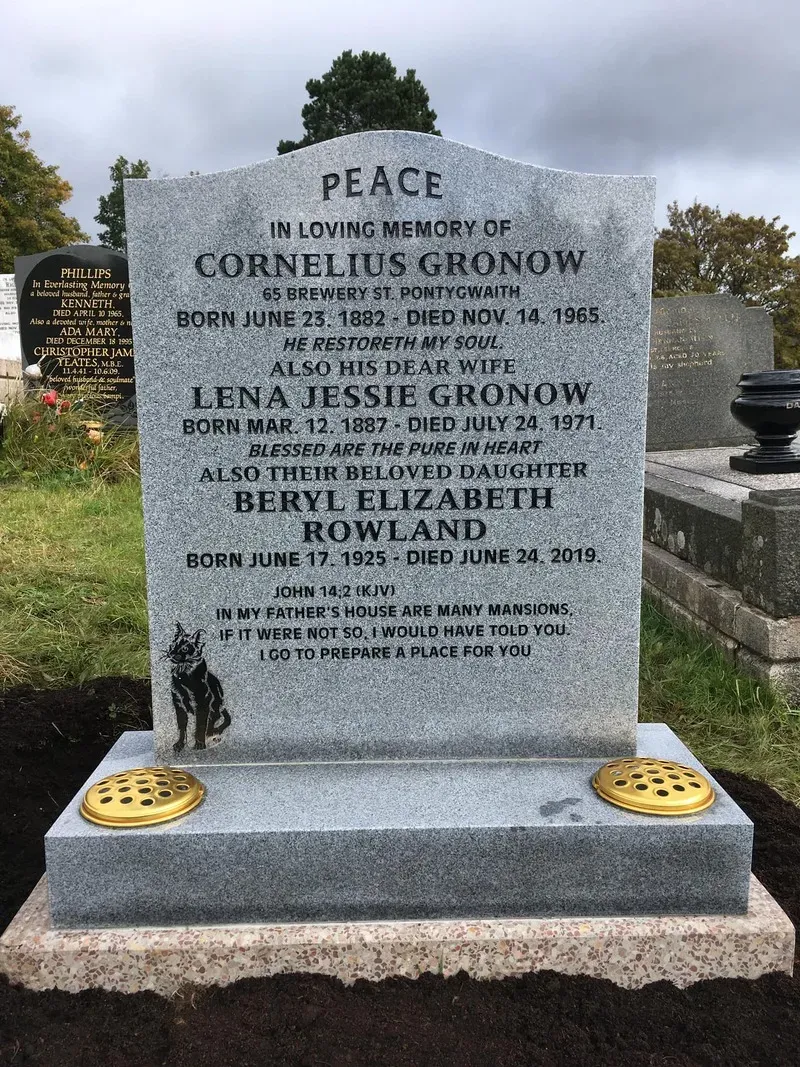 Grey granite headstone with a finely etched portrait and gold leaf inscription by FR Terrazzo