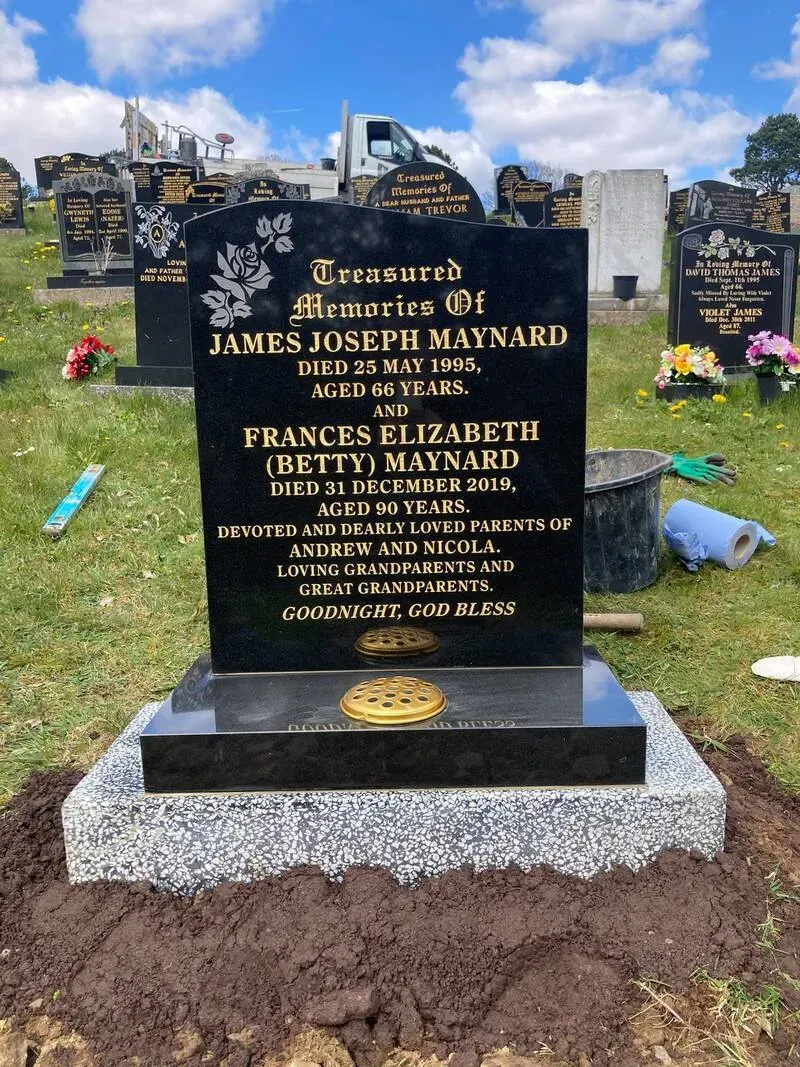 Black granite family memorial with gold leaf lettering, brass vase and a silver grey granite base by FR Terrazzo, Rhondda Cynon Taff