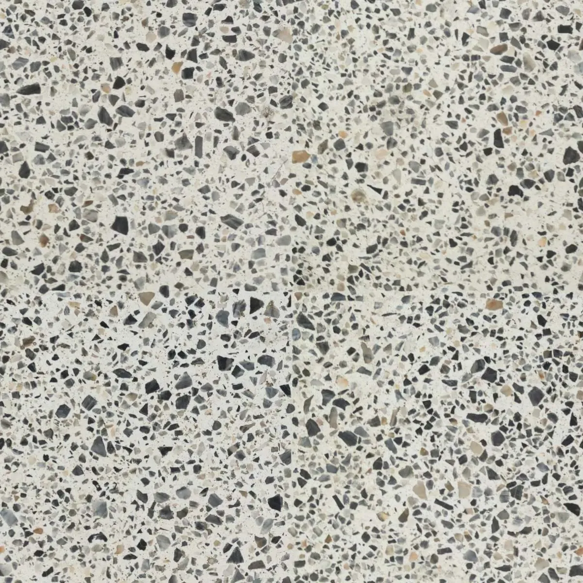 Close-up of a natural stone wall, representing the memorial stone FR Terrazzo orders from its suppliers